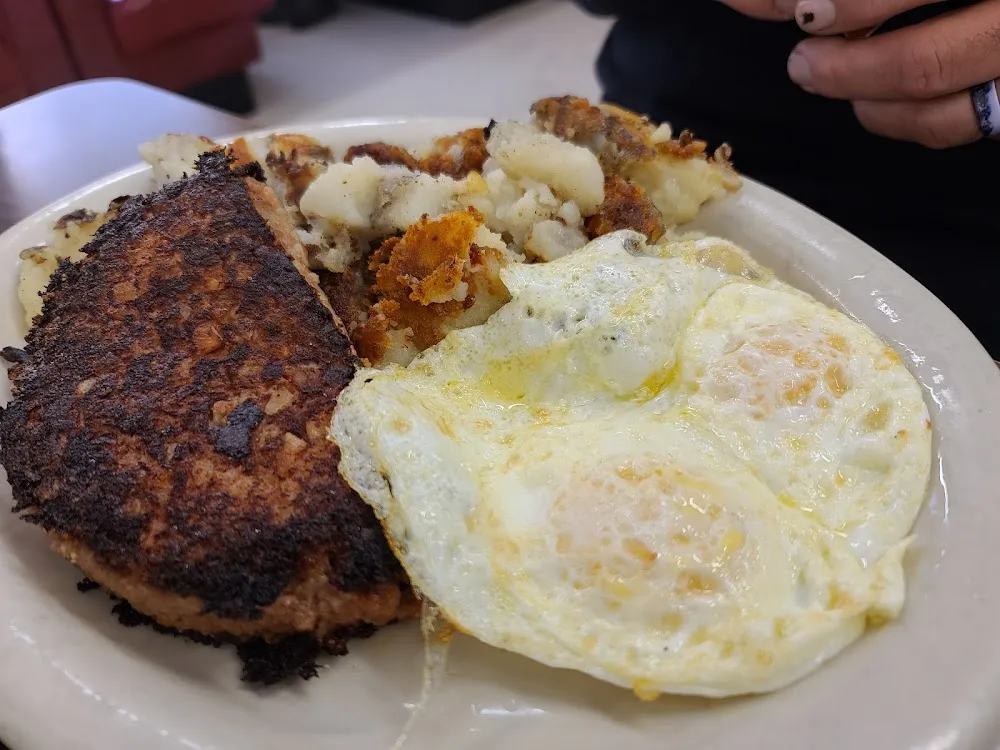 Corn Beef Hash & 2 Poached Eggs with German Potatos